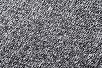 Texture of dense black fabric for tailoring. Canvas. Textile. Textile