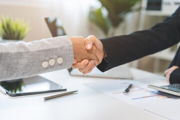 Successful asian young business woman, partnership, teamwork handshake or greeting together at office after project done, good deal. Happy business people, group meeting, colleagues shaking hands,