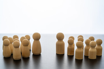 Conceptual representation, with wooden pawns, of gender differentiation and struggle. Males versus...