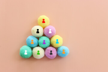 image of pastel colored circles with people figures, human resources, leadership and management concept