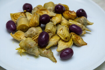 Portion of artichoke hearts and olives