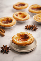 Traditional Portuguese custard tarts or Pastel de Nata freshly baked cream dessert. High quality photo
