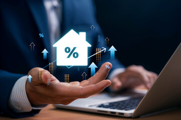 Real estate investment concept with businessman analyzing rising interest rates and housing market...