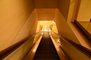 Close-up of the escalator. escalator convergence line. Indoor view.