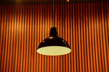 Close-up of the lighting indoors. Light bulb. Interior design, decoration. Lighting equipment.