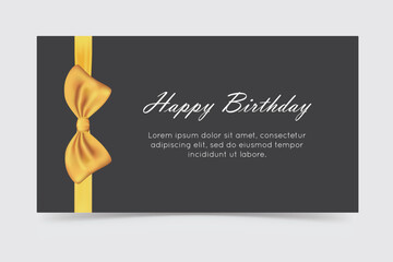 Elegant Happy Birthday card with gold ribbon and bow on black background, perfect for gift or celebration.