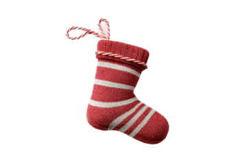 PNG Festive red and white knit christmas stocking with candy cane stripes