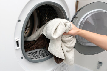 Using washing machine at home, household chores