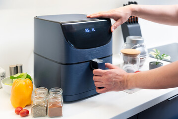 Air fryer machine in the kitchen