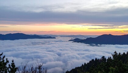 Obraz premium High Altitude Sunset Over Misty Cloudscape