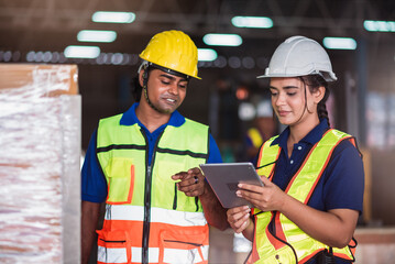 Indian Warehouse Staff Scanning Barcode and Checking Inventory with Tablet in Export Logistics Center