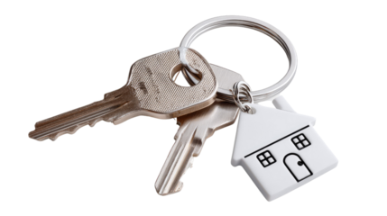 Keys to New Beginnings: Close-up of a silver key set and a house-shaped keychain, symbolizing homeownership, real estate, and new beginnings. 