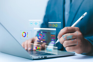 Businessman showing progress, data, business plan, software, work chart, smart technology office Technology developer time report Leading the way in designing intelligent, critical computing leaders.	