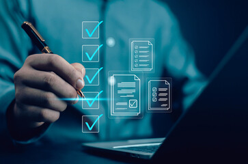 Business Performance Checklist Businessman Using Laptop Doing Online Checklist Survey On Computer...