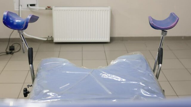 Empty gynecological chair for examination of girls and women. Women's health. Prevention illness. Early detection of cervix cancer. 