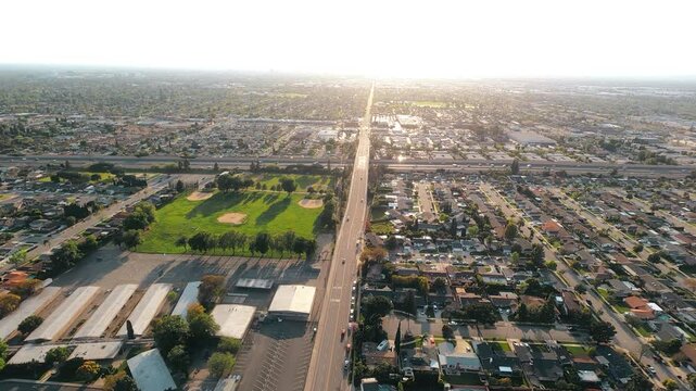 A sunset aerial flyover of the Los Angeles area. East Collins Avenue seen directly below. GoPro footage flown with FAA clearance by a licensed helicopter pilot. Longer versions may be available.