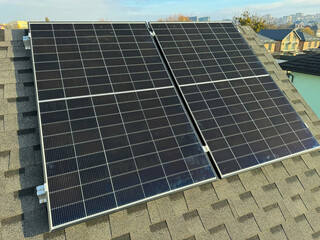 Modern house rooftop equipped with solar panels