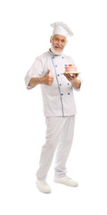 Professional pastry chef with delicious cake showing thumbs up on white background