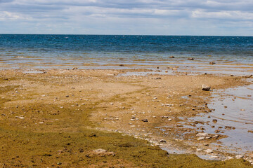 Exposed shoreline, near Nelson Point,  Peninsula State Park, Door County, Fish Creek, Wisconsin with the lower water level of Green Bay in late May