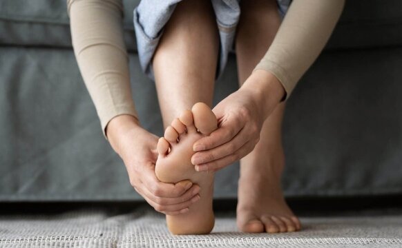 Foot Pain Discomfort and Soreness Massaging Aching Toes Treating Sore Feet From Plantar Fasciitis and Peripheral Neuropathy Relief At Home