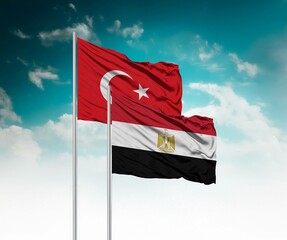  National flags of Turkey and Egypt wave side by side in a clear blue sky symbolizing international...