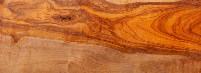 Brown wood background. Olive light bright wooden texture. Top view, long banner, copy space, close up.