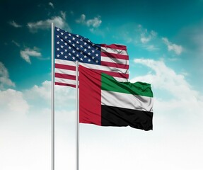  National flags of United States of America and United Arab Emirates wave side by side in a clear...
