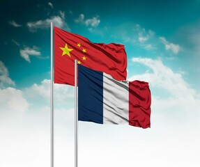  National flags of China and France wave side by side in a clear blue sky symbolizing international...