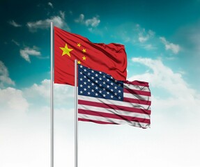  National flags of China and United States of America wave side by side in a clear blue sky...