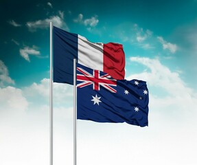  National flags of France and Australia wave side by side in a clear blue sky symbolizing...