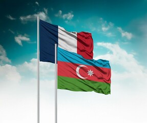  National flags of France and Azerbaijan wave side by side in a clear blue sky symbolizing...
