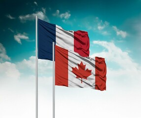  National flags of France and Canada wave side by side in a clear blue sky symbolizing...
