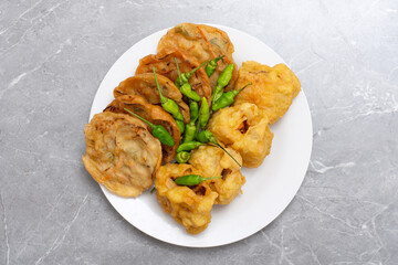 Fried food gorengan bakwan, Bala-bala, Tahu isi and tempeh with chili fritters Indonesian street food