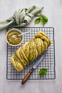 Babka braided bread with cheese and pesto flavor