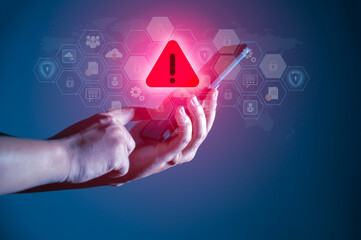 Hacker control and spying on your mobile phone. Symbol of caution in the use of cell phones.Alert...