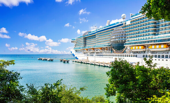 Mahogany Bay, Roatan, Honduras - March 03, 2025: Cruise ship Sun Princess docked at port Mahogany Bay, Roatan. The island is a popular Caribbean cruise destination