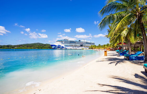 Mahogany Bay, Roatan, Honduras - March 03, 2025: Cruise ship Sun Princess docked at port Mahogany Bay, Roatan. The island is a popular Caribbean cruise destination