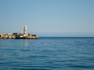 Lighthouse on the Coastline at Sea Yalta Crimea. Blue