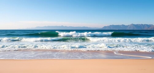 Distant mountains, ocean wave crashing on empty beach, copy space, landscape