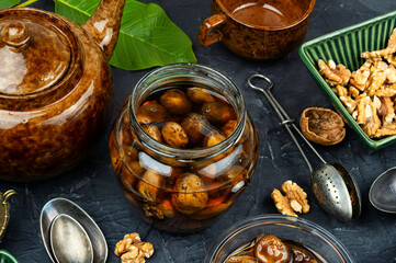 Aromatic jam from green walnuts.