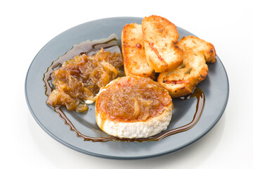 Goat cheese roll with caramelized onion and toast