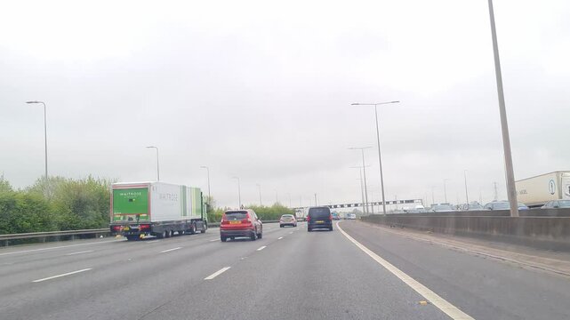 Dash Cam Footage of British Road Travel and Traffic Footage of M1 Motorways From Luton City to London Capital City of England During Cloudy and Rainy Day of April 15th, 2025