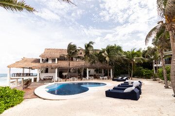 Luxurious beachfront villa with pool on Cozumel island