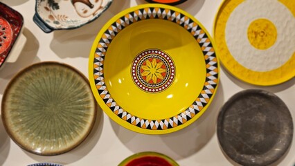 A dazzling spread of multicolored plates shines in the seafood restaurant—each dish artfully...