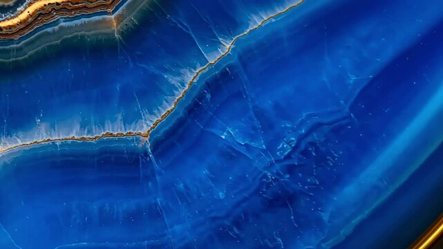 Vibrant blue agate gemstone, stone background texture