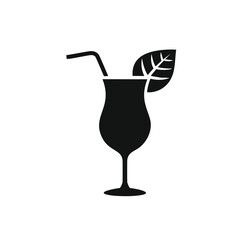 Tropical cocktail drink glass with straw and leaf