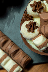 Chocolate easter egg on top of black stone