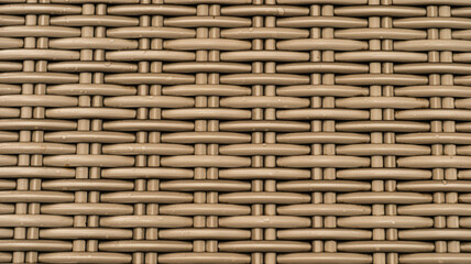 Detail of a chair made of woven rattan. This photo can be used as a background or poster etc.