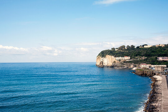Nisida isle with causeway connected to Posillipo & Bagnoli.  A Literary park with flooded crater behind, forbidden to public due to the juvenile correctional facility in the old castle; Naples, Italy.