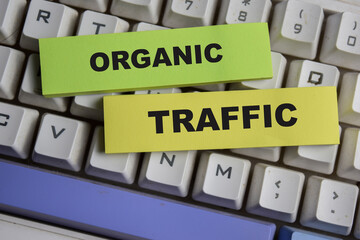 Concept of Organic traffic write on sticky notes isolated on keyboard.